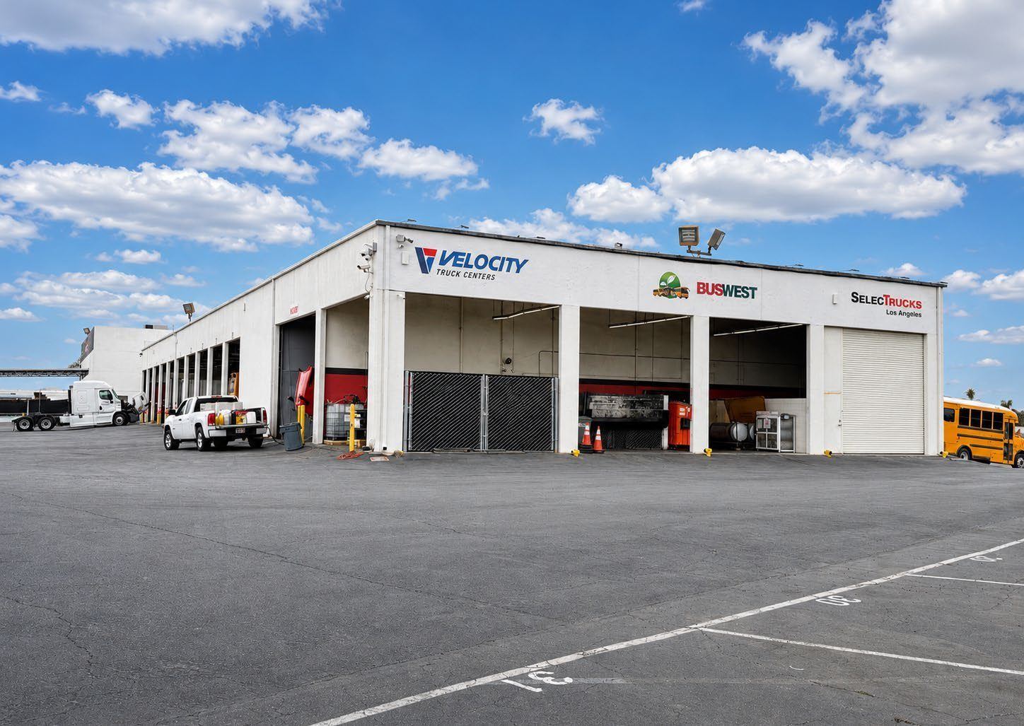 Drive-through heavy truck service bays